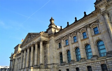 Parliament Building of German during sunny day. German Parliament Building and writes "To German People" top of the entrance