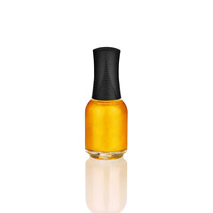 Golden glittering nail polish in closed glass bottle on white background isolated close up, gold color varnish, bright shiny yellow lacquer, sparkling enamel, beautiful shimmer gel, cosmetic accessory