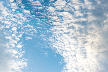 Obraz premium Clouds in the blue sky. Natural blue sky with cloud closeup or background..
