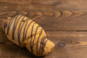 Homemade cakes, bun on a wooden background. close-up