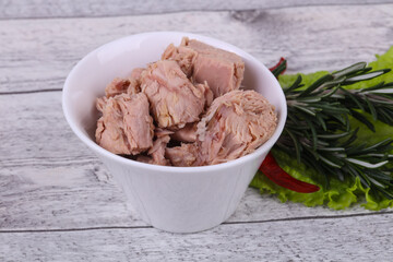 Tasty canned tuna fish in the bowl
