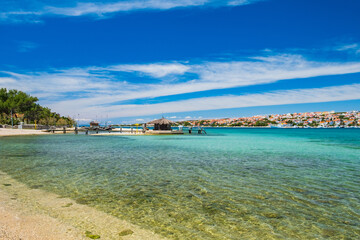 Adriatic sea in Croatia on Pag island, beautiful sand beach and bar in town of Novalja