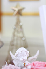 天使とフラワーアレンジ