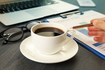 Concept of financial planning on black wooden table