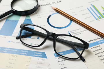 Concept of financial planning with accessories, close up