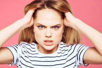 Blonde striped t-shirt emotion gesture hands displeased facial expression pink background