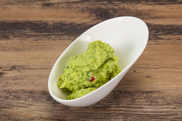 Avocado guacamole sauce with chili pepper