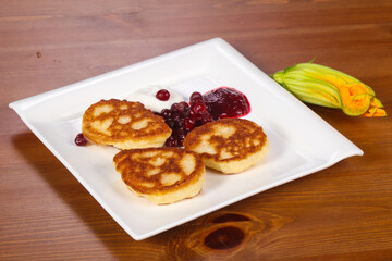 Pancakes with jam and berries