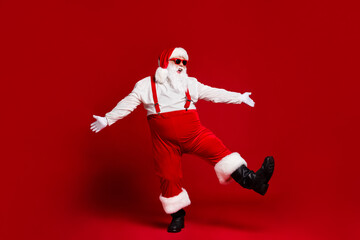Fototapeta na wymiar Full length body size view of his he attractive cheerful funny fat white-haired Santa dancing having fun clubbing festal event isolated bright vivid shine vibrant red burgundy maroon color background