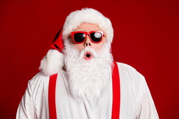 Close-up portrait of his he attractive amazed stunned wondered cheery Santa father pout lips wow reaction isolated over bright vivid shine vibrant red burgundy maroon color background