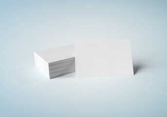 Stack of white business cards mockup isolated on blue 3d rendering