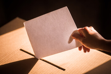 Conceptual image of a person voting during elections