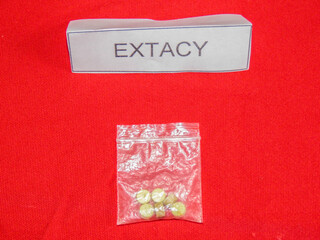 Police exhibit seized drugs on a table, war on drugs, anti-drug, exhibiton of seized drugs