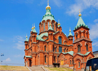 Fototapeta na wymiar Finland, Uspenski Cathedral Helsinki. This is one of the main decorations of Helsinki. It was built in the pseudo-Byzantine style in 1868. The temple is located on a high rocky hill near South Harbo