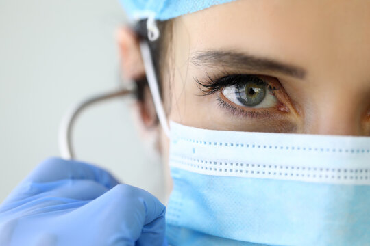 Portrait Of Doctor In Protective Medical Mask With Determined Look. Medical Assistance And Service Concept