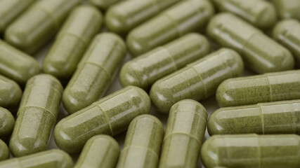 superfoods moringa capsules top view. Spirulina, chlorella capsules