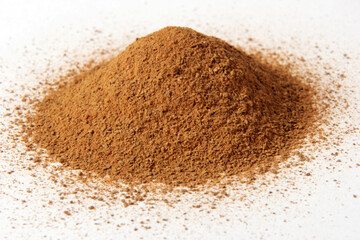  Cinnamon powder heap isolated on white background