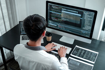 Developer programmer working on coding program software computer in office, Writing website and...