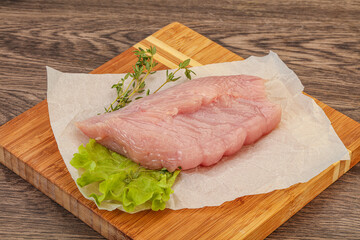 Raw turkey breast steak for cooking