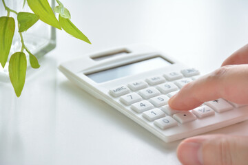 Calculator on a white desk