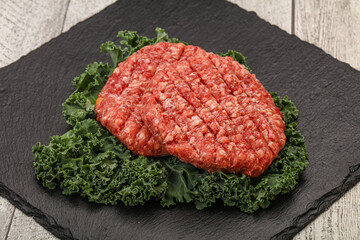 Raw beef burger cutlet for cooking