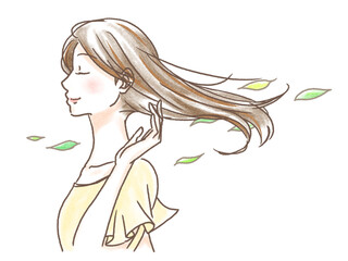 髪をなびかせる女性