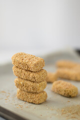 Vegan chickpeas nuggets. White background.