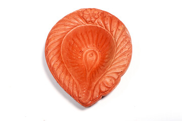 Close up of a beautifully designer handmade clay lamp isolated on white background