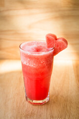 water melon Fruit shake with a heart shaped piece of watermelon