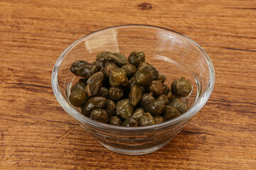 Tasty capers in the bowl