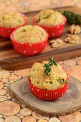 Muffins with rosemary, thyme, walnut and cheese