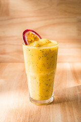 Passion Fruit shake with a slice of passion fruit on top for decor