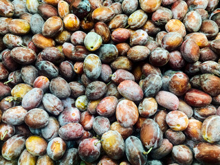 lots of ripe sweet plums for eating as a background