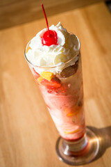 knickerbocker glory Ice cream sunday with fruit and whipped cream