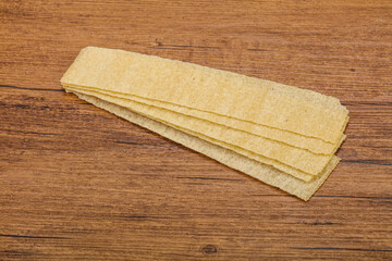 Natural salted potato chips heap