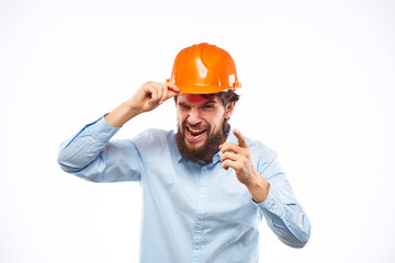 engineer in orange safety helmet in construction emotions professional lifestyle