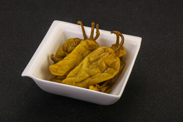 Marinated spicy and hot green pepper