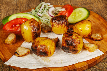 Caucasian traditional Potato shashlik with fat