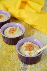 Tapioca pearl pudding dessert with coconut milk garnish with toasted desiccated coconut