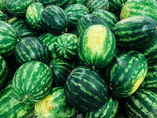 lots of ripe sweet watermelons to eat as a background
