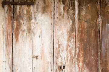 Vintage brown wooden door texture.