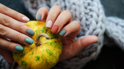 Cozy nails design.Place for text. cozy autumn fall concept. Trendy manicure.