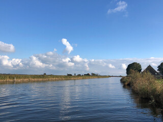 Canal around Gaastmeer during autumn in Friesland