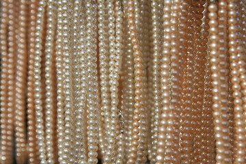 close-up of pearl necklace, graphic, with space for your own text