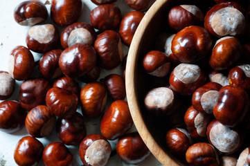 chestnuts on a wooden background