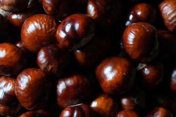 chestnuts on a wooden background