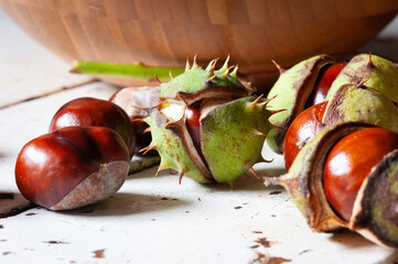 chestnuts on a wooden background