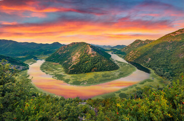 Awesome morning view of Canyon of Rijeka Crnojevica river, Skadar lake location. Exciting summer sunrise of Montenegro countryside. Beauty of nature concept background.. - obrazy, fototapety, plakaty