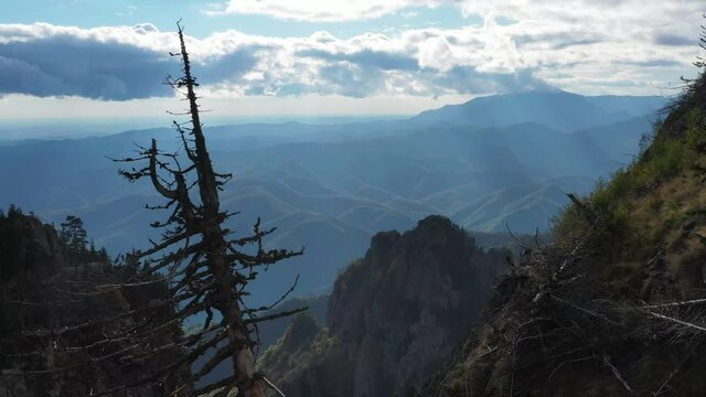 Aerial 4k drone clip of Cozia Mountains on a beautiful autumn day