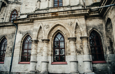 old historical temple fortress building church dilapidated middle ages building gothic style 